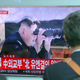 A local news program reporting about North Korea’s missile firing with an image of North Korean leader Kim Jong Un, at Seoul Train Station in Seoul, South Korea, Tuesday, July 4, 2017. (Image: AP)